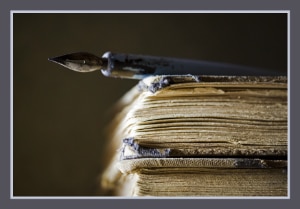 Old looking papers and pen